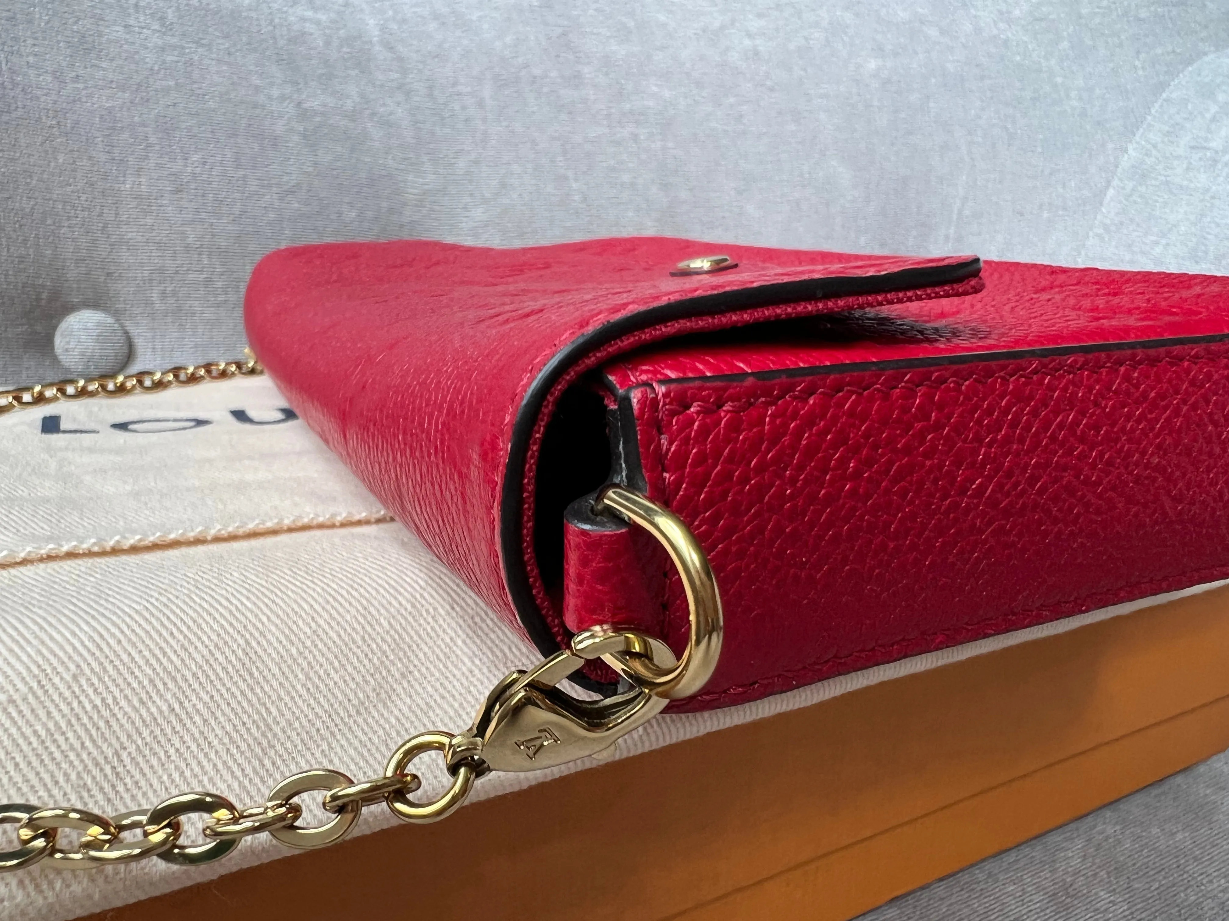 Louis Vuitton Felicie Pochette Red Empreinte Monogram (RRP £1160)